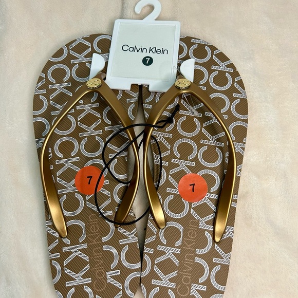 Calvin Klein Shoes - Calvin Klein Brown Flip Flops